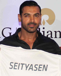 John Abraham. co - owner NorthEast United FC, with Indian football player Seityasen Singh