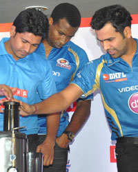 Michael Hussey, Rohit Sharma, Jasprit Bumrah and Kieron Pollard Rohit Sharma and Kieron Pollard