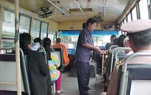 Bus conductors in Bangkok wear adult nappies!