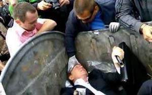 Ukrainian MP thrown into bin outside parliament house