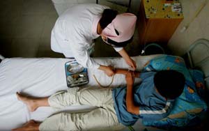 Chinese teen chops hand off to 'cure' internet addiction