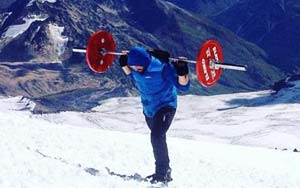 Russian bodybuilder Conquers Mount Elbrus with 75 Kilogram Barbell on His Back