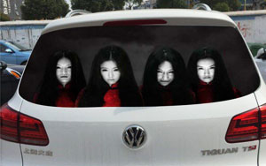 Drivers using freaky reflective face decals to discourage high-beam users