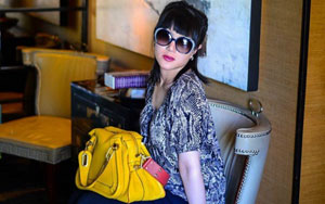 Thai Woman pocketed $1M buying designer bags and returning rip-offs