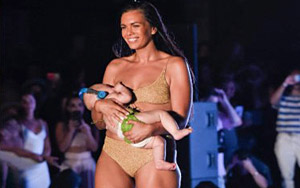 Model walks the ramp while breastfeeding her five-month-old daughter, Twitter goes berserk!