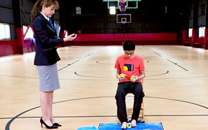 Watch - Teen Solves 3 Rubik's Cubes Simultaneously, Sets World Record