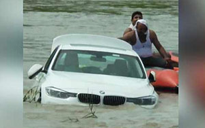 Denied Jaguar, angry Haryana youth pushes new BMW into river
