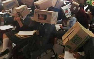Teacher Sparks Controversy for Making Students Wear Cardboard Boxes to Deter Cheating on Exam