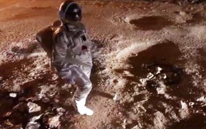 Artist Puts On Astronaut Costume to Highlight Crater-Size Road Potholes