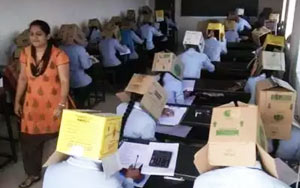 Karnataka - College students made to wear cardboard boxes at exam