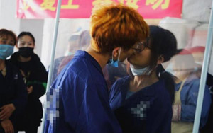 Outrage As China Factory Holds Kissing Contest To Celebrate Reopening
