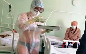 Russian Nurse Is Suspended After Wearing Bikini Under Transparent PPE Gown
