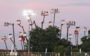 Fans Rent Cranes to Watch Car Race from Outside Arena During Pandemic