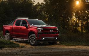 A Beautiful, red  Chevrolet off road truck