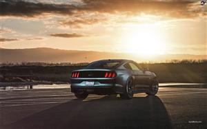 An incredible shot of Ford Mustang with sunset in the backdrop