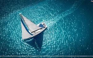 Aerial view of a white sailboat