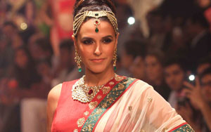 Neha Dhupia walked the ramp dressesd as a bride as showstopper for Gitanjali Jewels at the on-going India International Jewellery Week. 