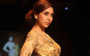 Karisma dazzles in gold