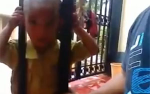 Kid's head stuck in a Gate