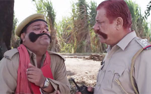 Welcome to the world of crazy characters of Tanakpur - Meet Rascal Rambeer Meena. Presenting the sixth Tanakpur ka Tan-Tanatan promo.<br>Miss Tanakpur is a political satire that unfolds in the backdrop of a Love-story set in a village of Haryana. It stars Annu Kapoor, Rahul Bagga, Ravi Kishan, Hrishita Bhatt and Om Puri. It`s directed by Vinod Kapri