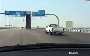 Truck Hits Signboard on Saudi Highway