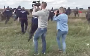 Hungarian Camerawoman Kicks, Trips Refugees