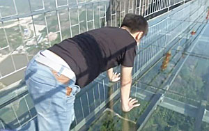 Tourists Brave Glass-Bottom Bridge