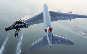 Jetman Flies Next To Airbus Jumbo Jet