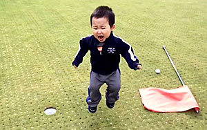 Little Boy Reacts to Missed Putt