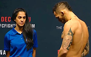 Girl Can't Help But Stare at UFC Fighters When They Weigh In