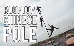  Stuntmen Do Some Slick Tricks On Rooftop Chinese Pole