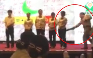 Manager Spanks Employees Onstage Over Poor Performance