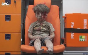 The Syrian Boy Pulled from the Rubble in Aleppo