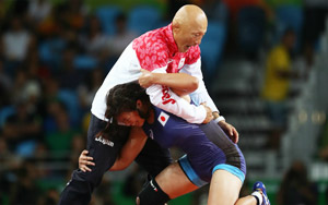 Wrestler Slams her coach on The Mat After Winning Gold