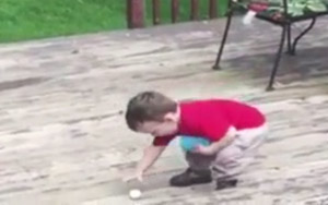 Little Boy Tries To Pick Up Balls... Again and Again