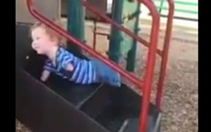 Motivational: The Kid With No Limbs Going Up the Slide!