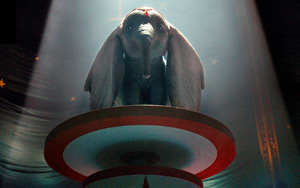 Watch the teaser of upcoming American fantasy adventure film `Dumbo`<br>Directed by Tim Burton<br>Cast: Colin Farrell, Michael Keaton, Danny DeVito, Eva Green, Alan Arkin<br><br>Storyline: Holt was once a circus star, but he went off to war and when he returned it had terribly altered him. Circus owner Max Medici (Danny DeVito) hires him to take care of Dumbo, a newborn elephant whose oversized ears make him the laughing stock of the struggling circus troupe. But when Holt`s children discover that Dumbo can fly, silver-tongued entrepreneur V.A. Vandevere (Michael Keaton), and aerial artist Colette Marchant (Eva Green) swoop in to make the little elephant a star.