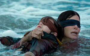 Trailer of Netflix American post-apocalyptic thriller `Bird Box`<br>
Cast: Sandra Bullock, Trevante Rhodes, Jacki Weaver, Rosa Salazar, Danielle Macdonald, Lil Rel Howery, Tom Hollander, BD Wong, Sarah Paulson, John Malkovich<br><br>Storyline: When a mysterious force decimates the world`s population, only one thing is certain: if you see it, you take your life. Facing the unknown, Malorie finds love, hope and a new beginning only for it to unravel. Now she must flee with her two children down a treacherous river to the one place left that may offer sanctuary. But to survive, they`ll have to undertake the perilous two-day journey blindfolded.