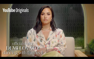 Featuring the exclusive first listen to Demi Lovato`s title song to the powerful four-part documentary event, "Dancing With the Devil."<br>
Premiering March 23, Demi Lovato holds nothing back in this powerful four part documentary series exploring every aspect that led to her nearly fatal overdose in 2018, and her awakenings in the aftermath. Director Michael D. Ratner is granted unprecedented access to the superstars personal and musical journey during the most trying time of her life as she unearths her prior traumas and discovers the importance of her physical, emotional, and mental health. Far deeper than an inside look beyond the celebrity surface, this is an intimate portrait of addiction, and the process of healing and empowerment.